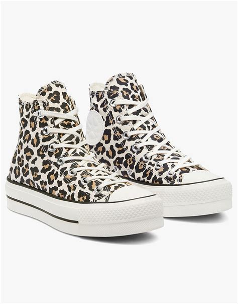 leopard print high top sneakers.